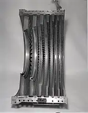 An example of the appearance of minor compressor blade tip rubs on their shrouds.