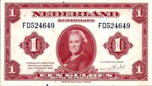 Dutch banknote.  In the center is an oval portrait of an elderly woman.  Legend on the bottom says "Een Gulden" (One Guilder / Legal Tender).   Uitgegeven Krachtens Koninklijk Besluit van  Februai 1943, no. 2"  (Issued pursuant to Royal Decree of February 1943, No. 2).  American Bank Note Company" is printed in small letters on the bottom margin.